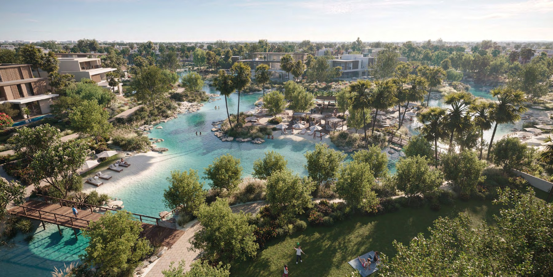 Aerial view of a swimmable lagoon at The Acres